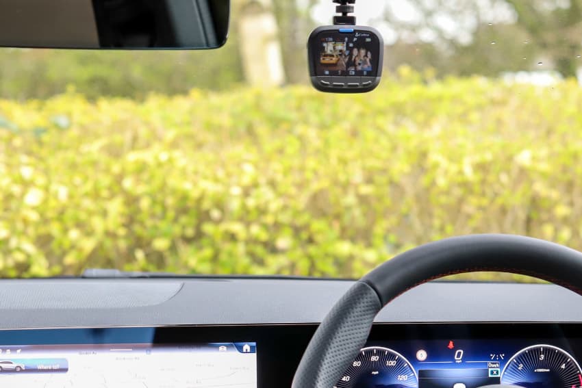 Interior of car with dash cam installed