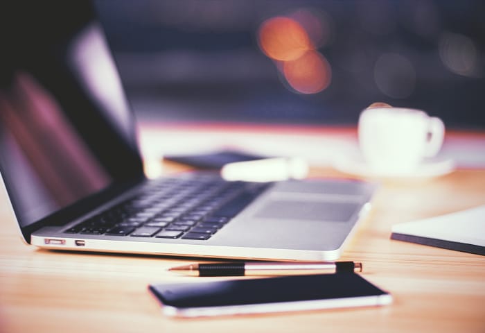 Laptop & phone on desk