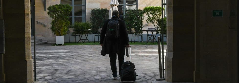 Man walking with his suitcase