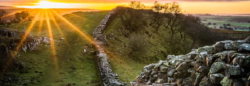 Hadrian's Wall with sunset in background