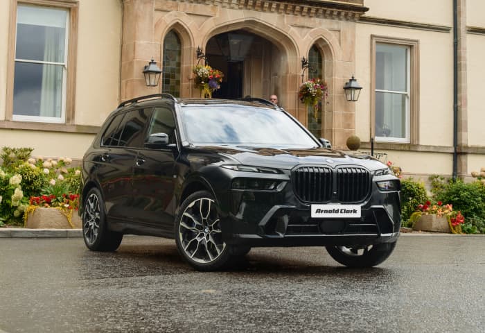 Angled front view of black BMW X7